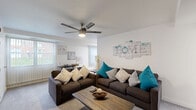 Located at 2500 Knights Rd in Bensalem, PA, this 2-bedroom, 1-bathroom residence offers a thoughtfully organized single-floor layout designed for comfortable everyday living. The living room serves as the heart of the home, featuring plush carpeting, a ceiling fan with light fixture, and large vertical-blind windows that invite natural light and outdoor views. The space flows naturally into a dedicated dining area and a functional kitchen outfitted with warm wood cabinetry. The primary bedroom is a well-sized retreat with soft carpet flooring and ample closet storage. The second bedroom features a large window with vertical blinds, adding brightness to the space, along with its own closet. Across both bedrooms, the clean white walls and carpet flooring create a calm, cohesive atmosphere. The full bathroom impresses with marble-style tile surrounding the tub-shower combo, a clean white vanity with stone countertop, and tasteful tile flooring. A utility room and hallway with additional closets round out the layout, providing generous storage throughout. With four closets total, this residence balances practicality and comfort in a compact, efficient footprint.