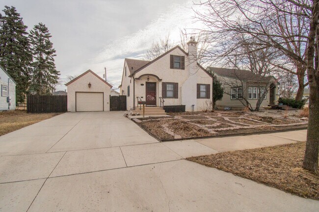 Building Photo - Charming 4-Bedroom Rental with Garage & Large Fenced Backyard!