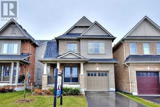 Building Photo - 223 Windfields Farm Dr W