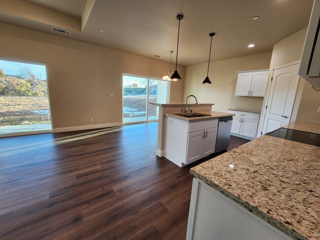 Kitchen livingroom view to backyard - 21865 Preston Pl