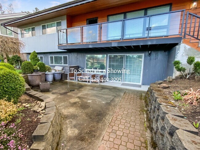 Photo - "Charming Bellevue Retreat: Spacious 2-Bed, 2-Bath with Finished Basement!" Apartment