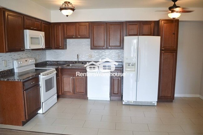 Building Photo - 5995 W Hampden Ave