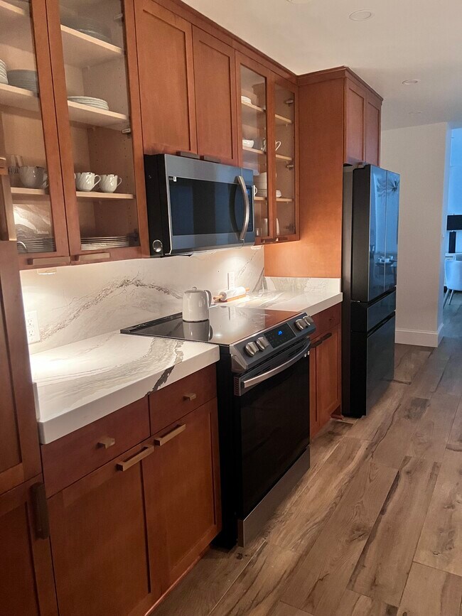 Lighting under cabinets provide a soft , inviting feel. - 3530 Piedmont Rd NE