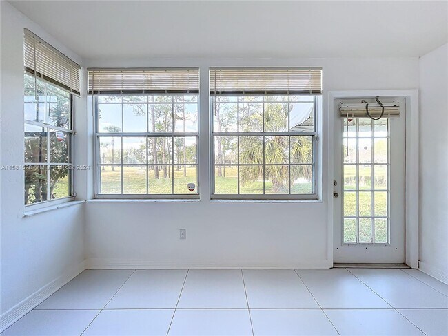 Building Photo - 1803 Palm Beach Trace Dr