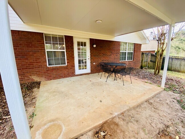 Building Photo - 8302 Magnolia Village Dr N