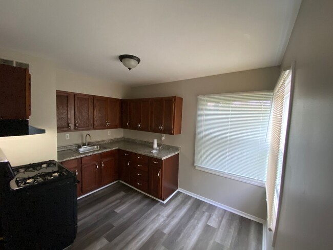 Building Photo - Updated Three Bedroom Move In Ready Home!