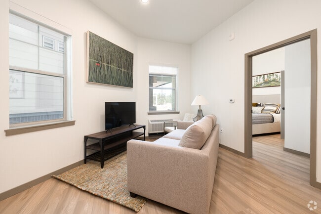 2BR, 1BA - 733SF - Living Room - The Meadowmark 55+ Active Adult Affordable Living