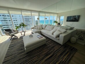 Building Photo - 10275 Collins Ave