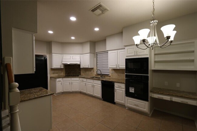 Foto del edificio - 13607 Robin Hill Ct