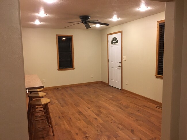 Dining room/front entry featuring engineered hardwood flooring. - 212 Franklin St