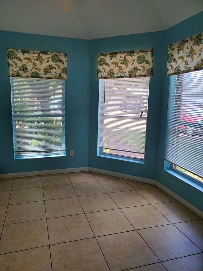 Breakfast room off the kitchen, has garage access. - 1842 Tomlinson Trail Dr