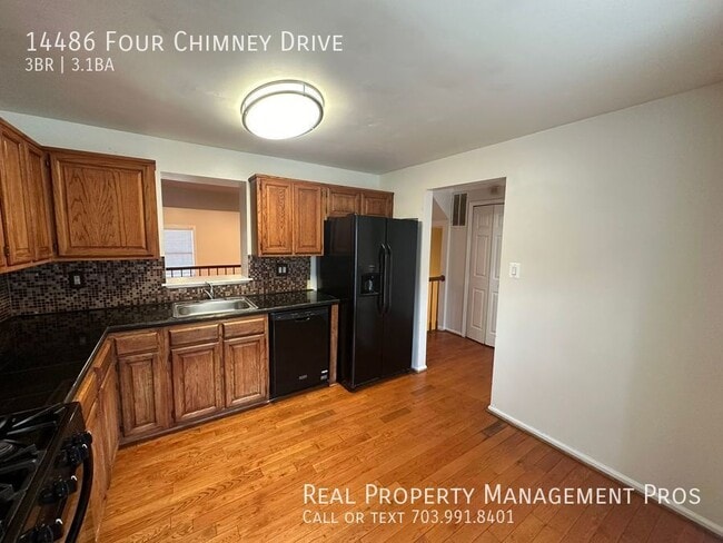 Foto del edificio - 14486 Four Chimney Dr