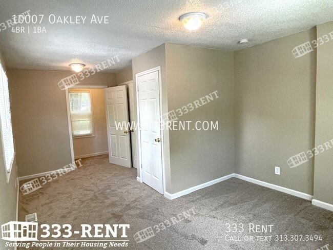 Building Photo - 10007 Oakley Ave