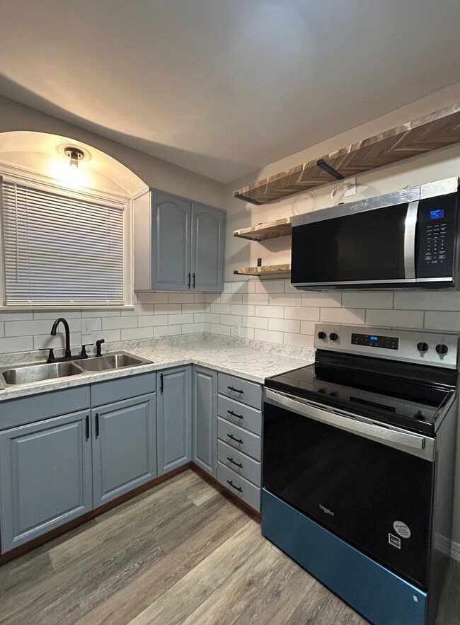 Stylish kitchen with subway tile backsplash - 3117 Parkside Rd