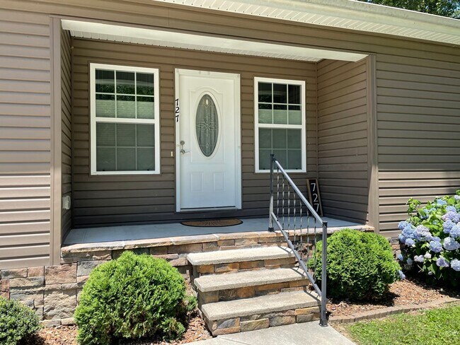Building Photo - Practically New 3 BR, 2 BA, with Private B...