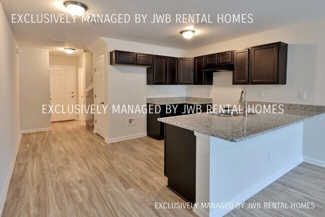 Building Photo - 8486 McGirts Village Ln
