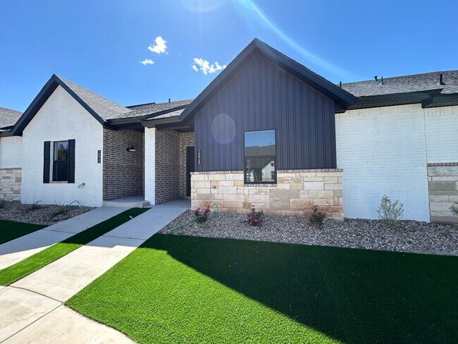 Foto del edificio - Luxury Two Bedroom Townhome in Abbey Glen ...