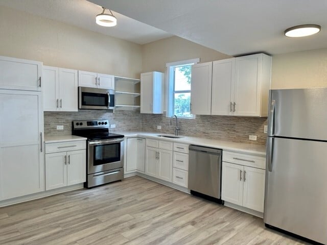 Kitchen with new appliances - 106 E Hanna Ave