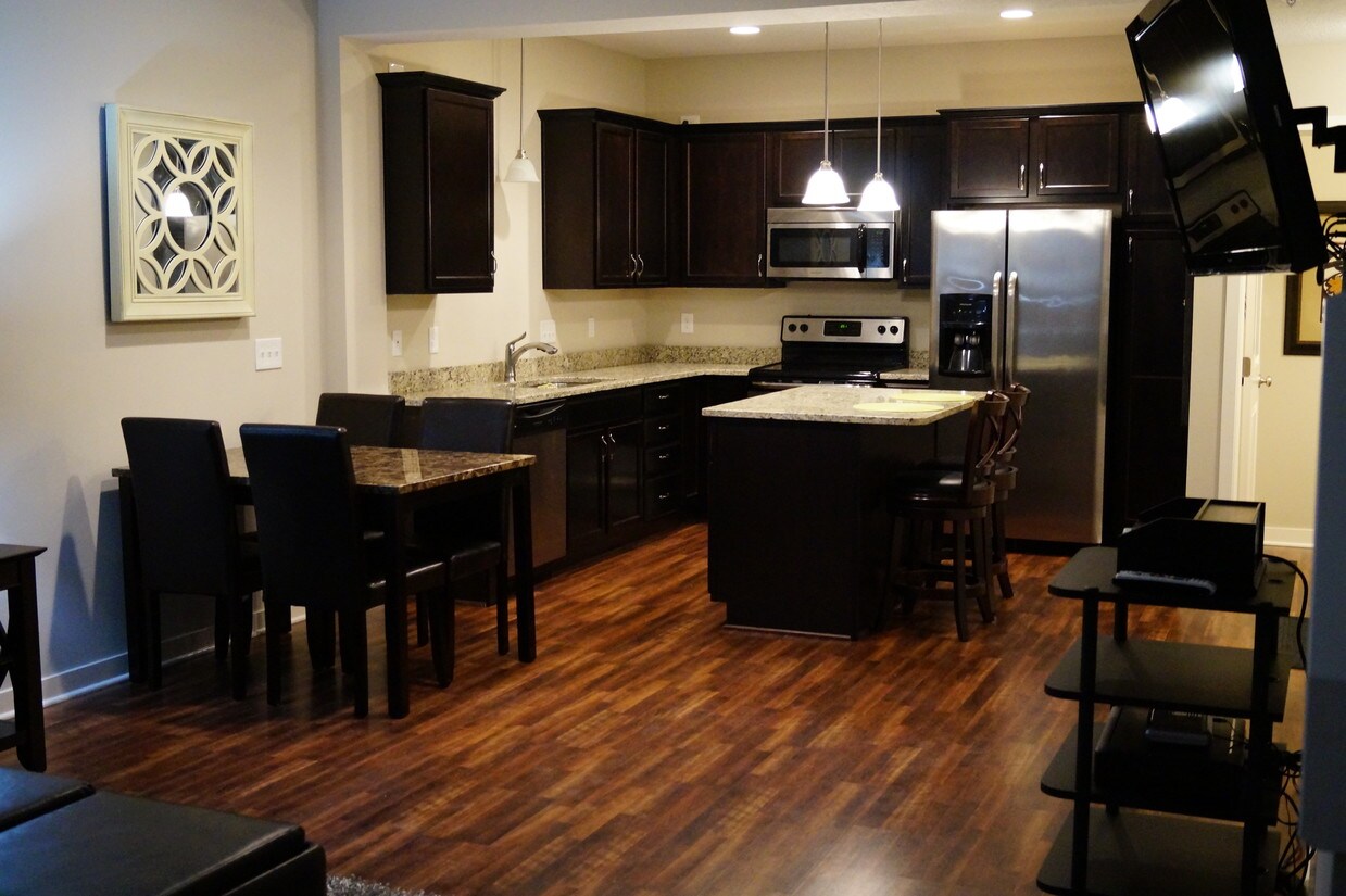 laminate floor throughout kitchen and living - 165 80th St