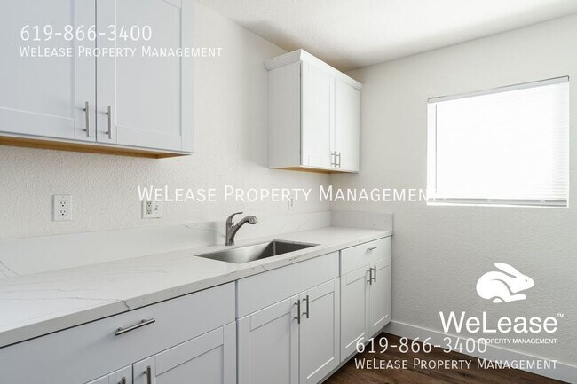 Foto del edificio - 3965 Logan Ave