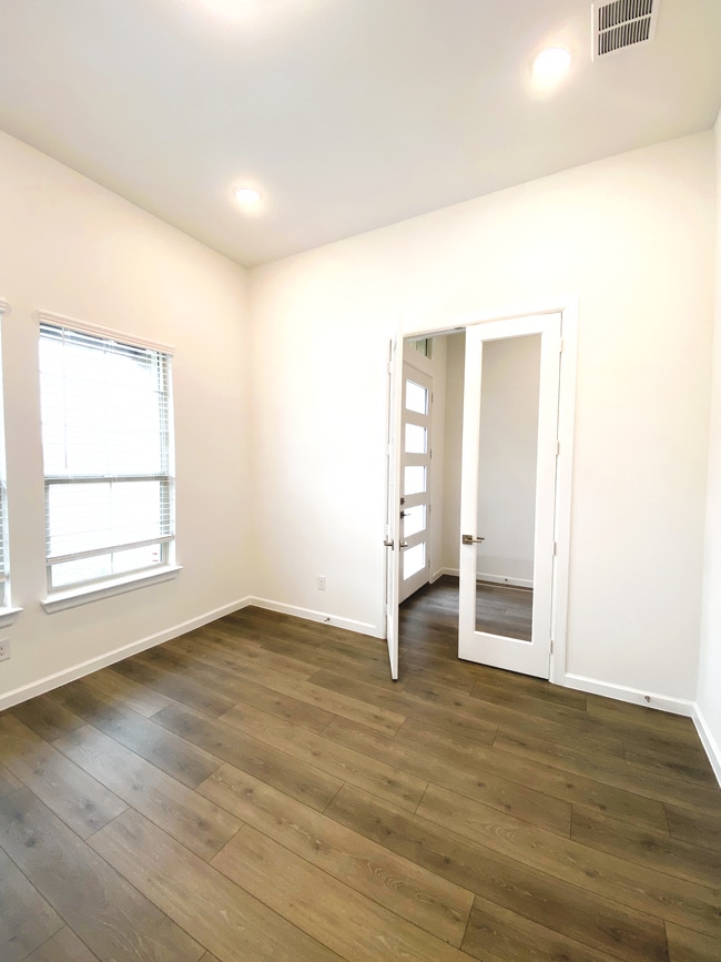 Office with French doors to the right - 621 Hummingbird Dr