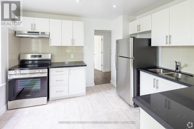 Photo du bâtiment - 875-875 Avenue Rd