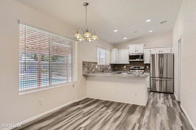 Building Photo - 4 br, 2 bath House - 8009 W Desert Cove Av...