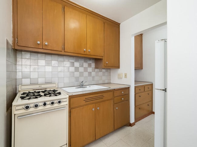 New range in kitchen. Not shown in this photo - 4965 3rd St NE