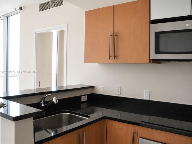 Building Photo - 300 S Biscayne Blvd