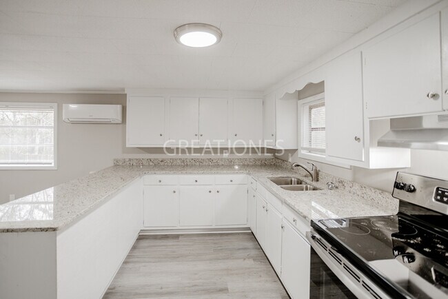 Building Photo - NOW OFFERING HALF OFF THE FIRST FULL MONTH...