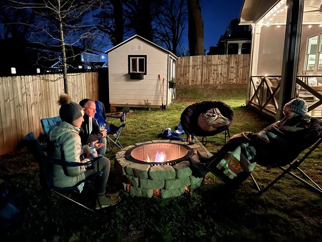 Cozy backyard with fire pit and storage shed - 3123 Cedar St