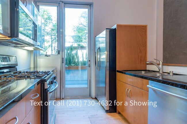 Building Photo - Modern Large 2 Bedroom, 2.5 Bath Rowhouse ...