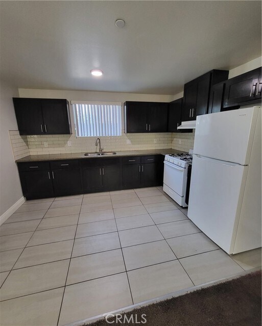 Foto del edificio - 1351 W 58th St