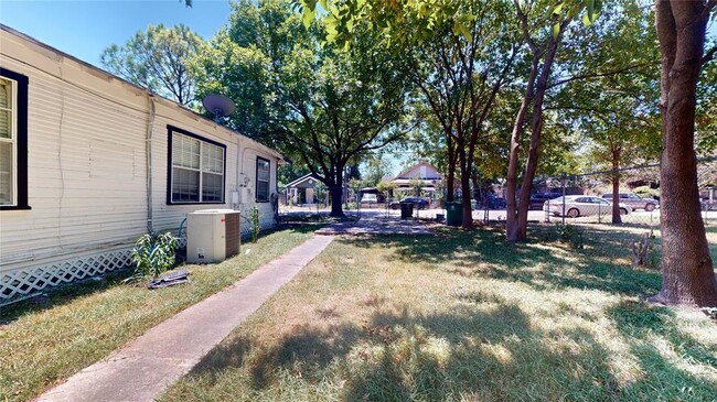 Building Photo - 6827 Avenue Q