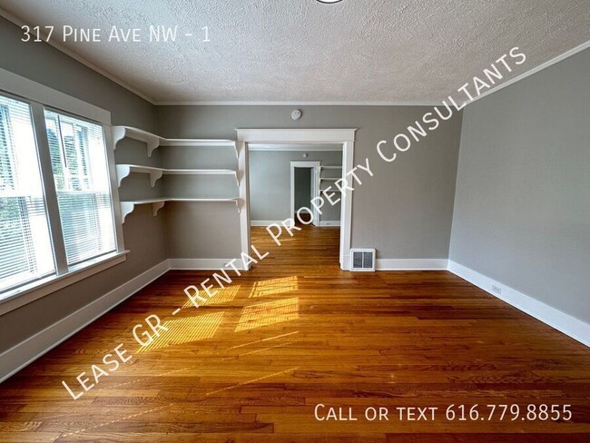 Building Photo - Updated lower 2 bedroom on the West side o...