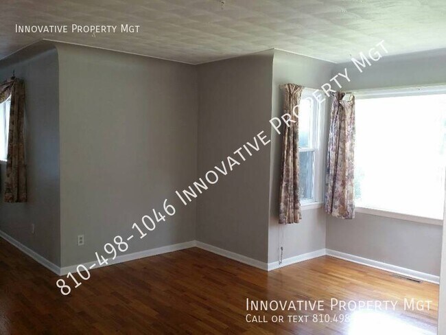 Building Photo - Spacious 4 bedroom , 1 1/2 bath home in Ga...