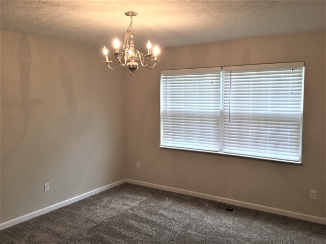 Foto del edificio - 5910 Hidden Oaks Court
