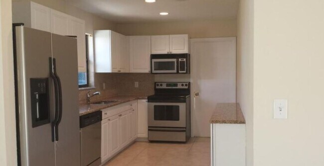 Building Photo - 3/2 with pool for rent