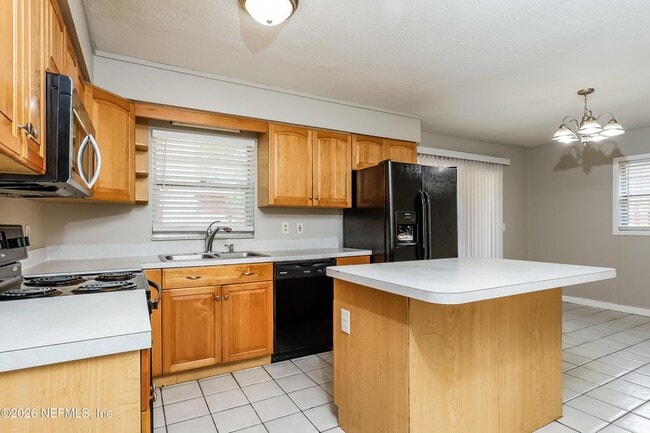 Building Photo - 7930 Rondeau Dr E