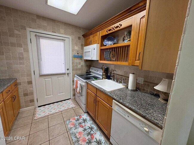 Building Photo - 2100 W Beach Dr