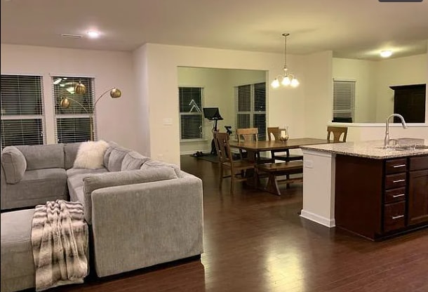 Open concept living room, dining and kitchen - 248 Tilth St