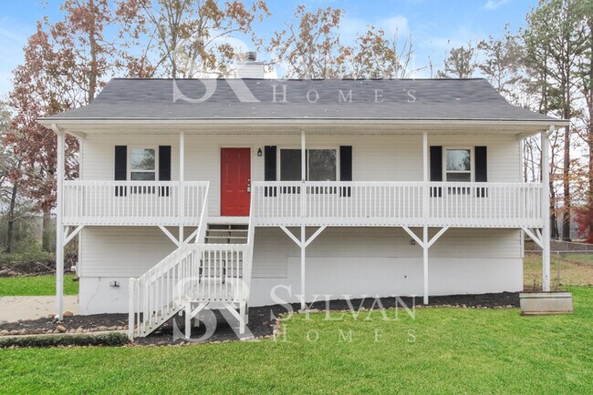 Foto del edificio - The living is easy in this 4 bedroom, 2 ba...