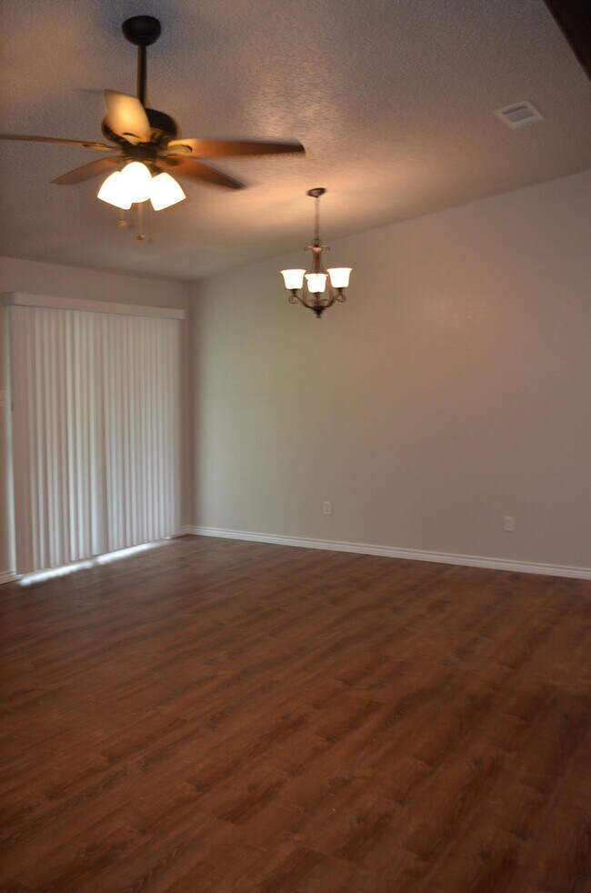 Building Photo - This 3 Bedroom Home with Fireplace is a must see!