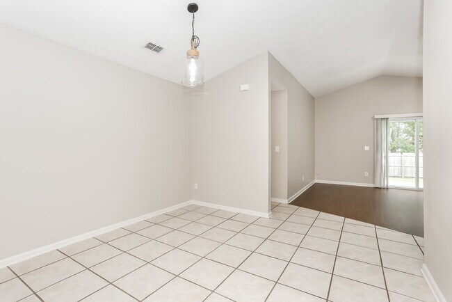 Building Photo - 7859 Collins Ridge Blvd E