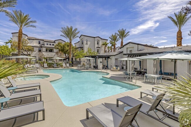 Whether youre soaking up the sun or unwinding in the shade, the upgraded pool space offers the perfect spot to cool down, recharge, and savor those sunny Vegas days in style at The Michael B. - The Michael B Townhomes and Flats