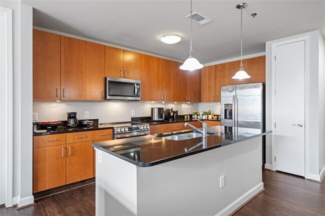 Building Photo - 711 Cosmopolitan Dr NE