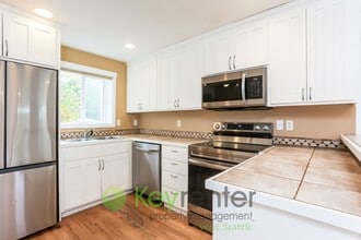 Building Photo - 8450B 25th Ave SW