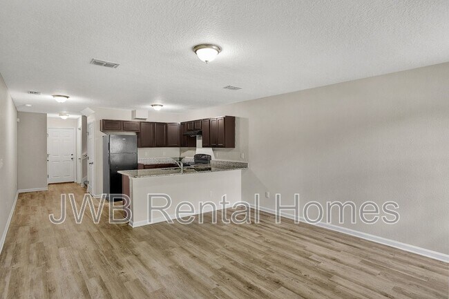Building Photo - 8480 McGirts Village Ln