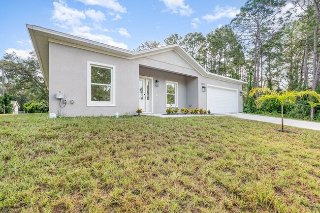 Building Photo - BRAND NEW! 4/2 PALM BAY!