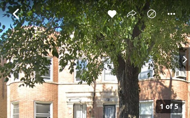 Building Photo - 6342 S Vernon Ave